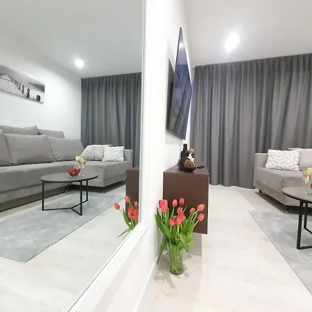 Apartament Ostseetraum - Pool, Sauna, Jacuzzi, 2 Bikes, Spielplatz, Apartments Kołobrzeg